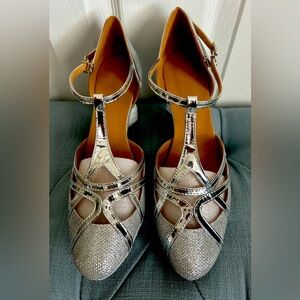 Ladies silver dance shoes, brand new never worn. Leather sole size 9.5.